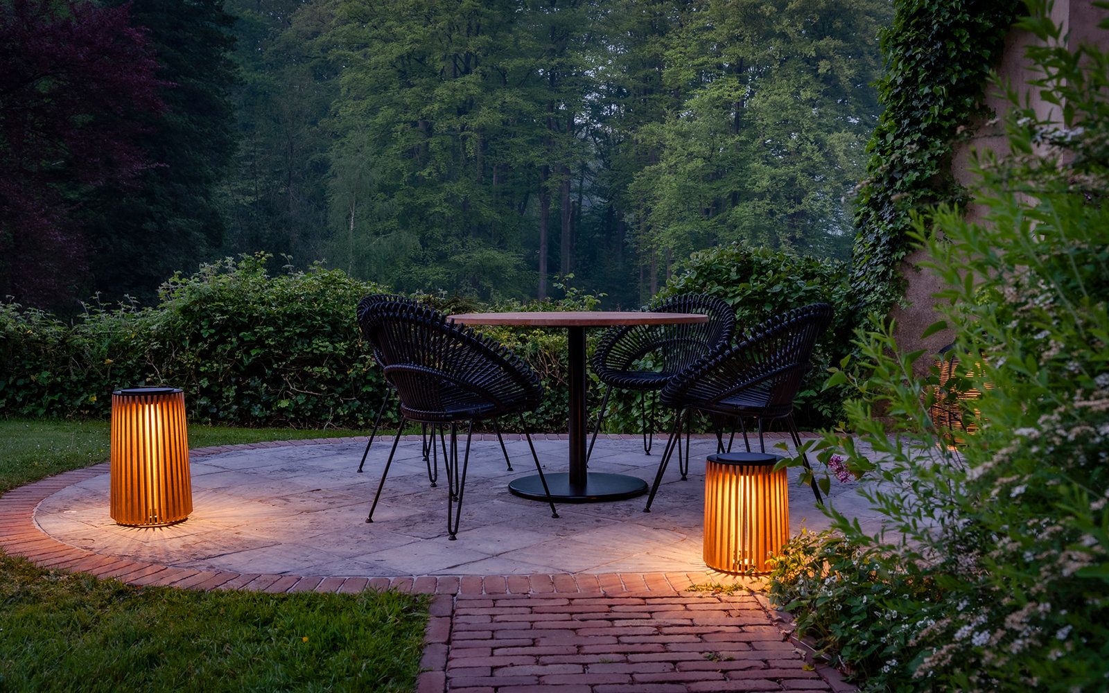 Roxy dining chair with ronda bistro table and maya lanterns