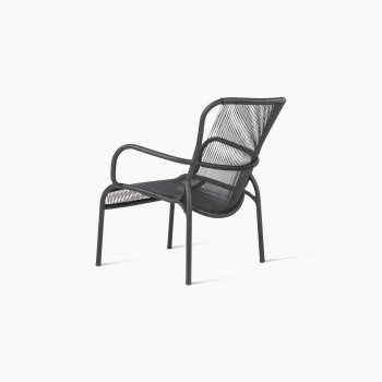 Angled back view of Vincent Sheppard’s black Loop lounge chair in aluminium and rope	