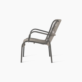 Side view of Vincent Sheppard’s Loop lounge chair in Fossil Grey rope and aluminium	