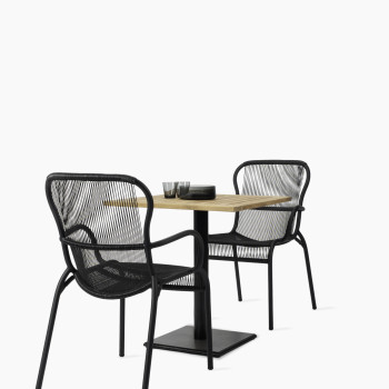 Vincent Sheppard Loop dining chairs with Quadro bistro table on white background