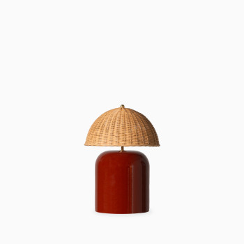 Arvin table lamp in maroon with a woven Lloyd Loom dome shade on a glossy ceramic base