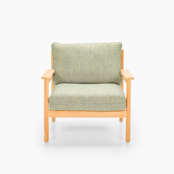 Vincent Sheppard Oda lounge chair with Fig Green cushions and untreated teak frame in flax finish	
