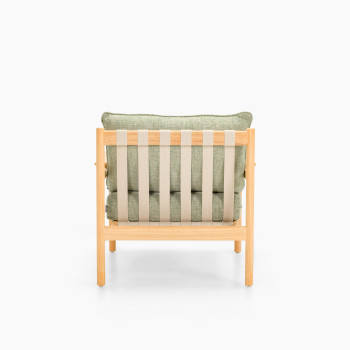 Vincent Sheppard Oda lounge chair with Fig Green cushions and untreated teak frame	