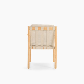 Back view of Vincent Sheppard Oda dining chair with Lime White bouclé cushions and untreated teak frame	